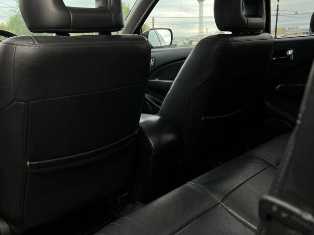 Черный Мицубиси Аутлендер, объемом двигателя 2.38 л и пробегом 0 тыс. км за 5999 $, фото 1 на Automoto.ua