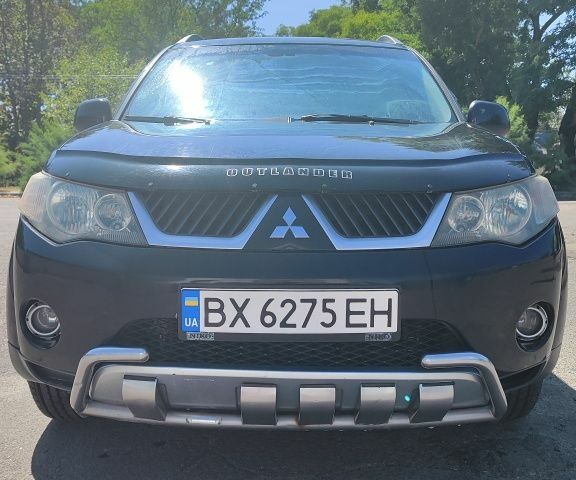 Чорний Міцубісі Аутлендер, об'ємом двигуна 2.4 л та пробігом 180 тис. км за 9000 $, фото 1 на Automoto.ua