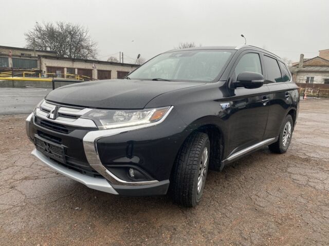 Черный Мицубиси Аутлендер, объемом двигателя 2 л и пробегом 76 тыс. км за 20800 $, фото 1 на Automoto.ua