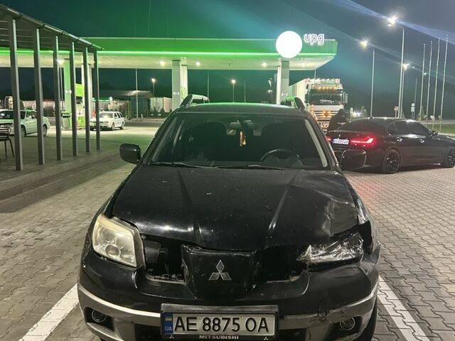 Чорний Міцубісі Аутлендер, об'ємом двигуна 2 л та пробігом 250 тис. км за 3700 $, фото 1 на Automoto.ua