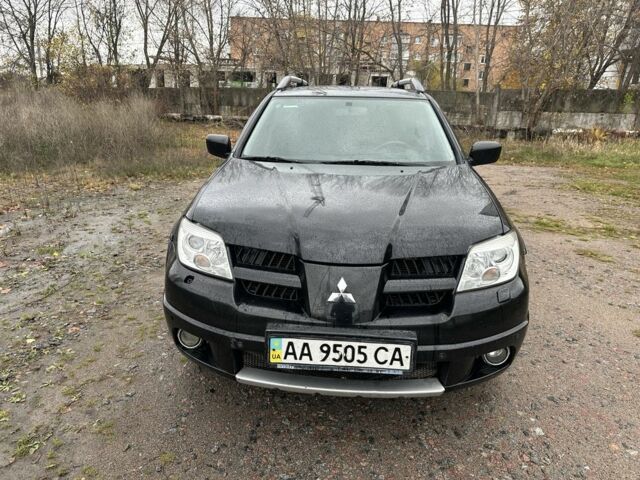 Чорний Міцубісі Аутлендер, об'ємом двигуна 2.4 л та пробігом 220 тис. км за 4300 $, фото 1 на Automoto.ua