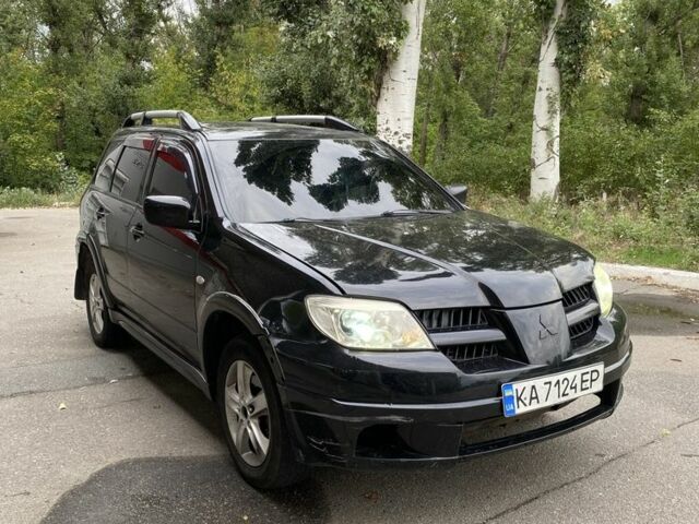 Чорний Міцубісі Аутлендер, об'ємом двигуна 2.4 л та пробігом 239 тис. км за 4200 $, фото 1 на Automoto.ua