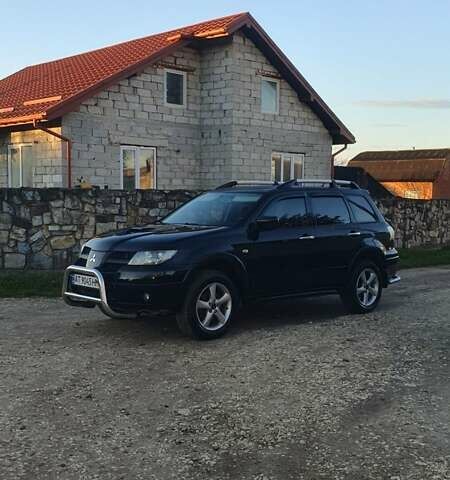 Міцубісі Аутлендер 2006 у Івано-Франківську на Automoto.ua Чорний Міцубісі Аутлендер, об'ємом двигуна 2 л та пробігом 263 тис. км за 7250 $, фото 1 на Automoto.ua