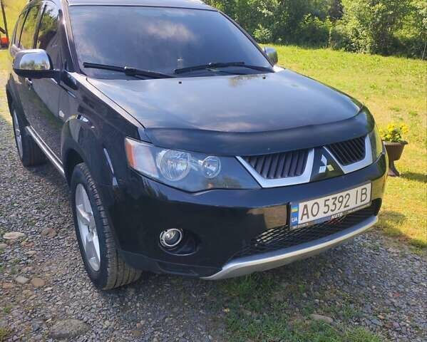 Чорний Міцубісі Аутлендер, об'ємом двигуна 2 л та пробігом 283 тис. км за 9000 $, фото 1 на Automoto.ua