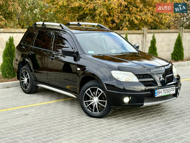 Міцубісі Аутлендер 2007 у Одесі на Automoto.ua Чорний Міцубісі Аутлендер, об'ємом двигуна 2.4 л та пробігом 201 тис. км за 7700 $, фото 1 на Automoto.ua