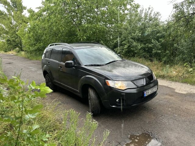 Чорний Міцубісі Аутлендер, об'ємом двигуна 2 л та пробігом 500 тис. км за 4200 $, фото 1 на Automoto.ua