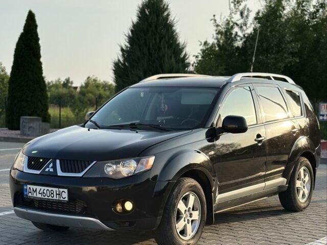 Чорний Міцубісі Аутлендер, об'ємом двигуна 2 л та пробігом 345 тис. км за 8500 $, фото 1 на Automoto.ua