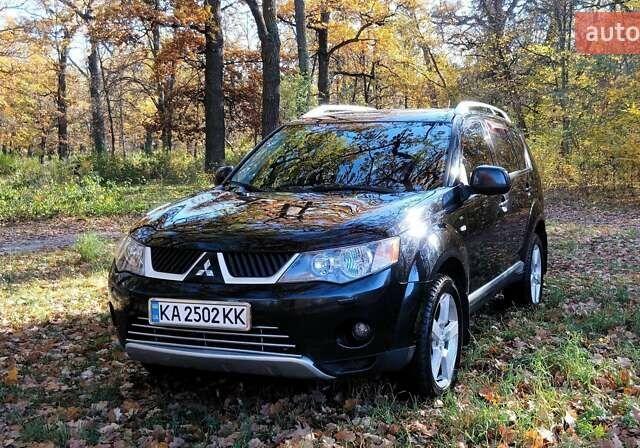 Міцубісі Аутлендер 2007 у Белой Церкве на Automoto.ua Чорний Міцубісі Аутлендер, об'ємом двигуна 3 л та пробігом 230 тис. км за 8800 $, фото 1 на Automoto.ua
