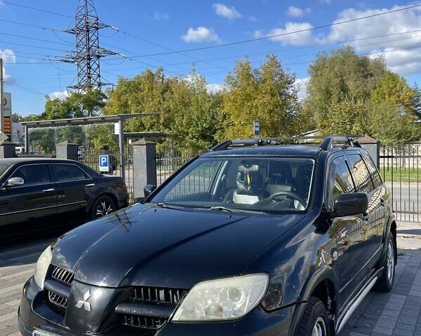 Мицубиси Аутлендер 2007 в Львове на Automoto.ua Черный Мицубиси Аутлендер, объемом двигателя 2.38 л и пробегом 217 тыс. км за 6199 $, фото 1 на Automoto.ua