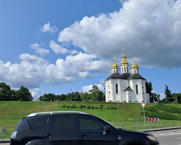 Чорний Міцубісі Аутлендер, об'ємом двигуна 3 л та пробігом 311 тис. км за 11000 $, фото 1 на Automoto.ua