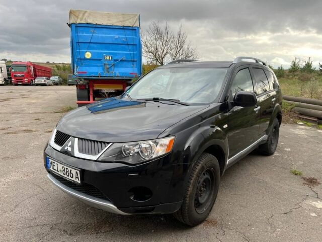 Черный Мицубиси Аутлендер, объемом двигателя 2.2 л и пробегом 190 тыс. км за 4800 $, фото 1 на Automoto.ua