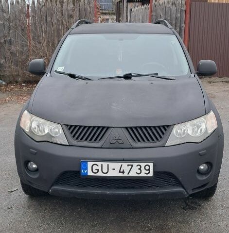 Чорний Міцубісі Аутлендер, об'ємом двигуна 2 л та пробігом 260 тис. км за 4500 $, фото 1 на Automoto.ua