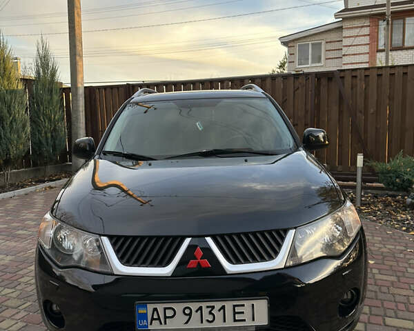 Чорний Міцубісі Аутлендер, об'ємом двигуна 3 л та пробігом 238 тис. км за 11200 $, фото 1 на Automoto.ua