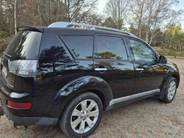 Чорний Міцубісі Аутлендер, об'ємом двигуна 2 л та пробігом 236 тис. км за 4419 $, фото 1 на Automoto.ua