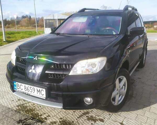 Міцубісі Аутлендер 2007 у Львові на Automoto.ua Чорний Міцубісі Аутлендер, об'ємом двигуна 2.4 л та пробігом 295 тис. км за 6800 $, фото 1 на Automoto.ua
