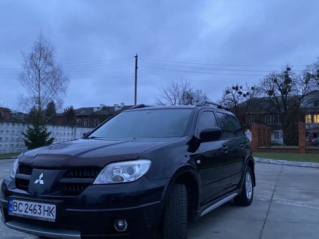 Чорний Міцубісі Аутлендер, об'ємом двигуна 2 л та пробігом 271 тис. км за 6799 $, фото 1 на Automoto.ua