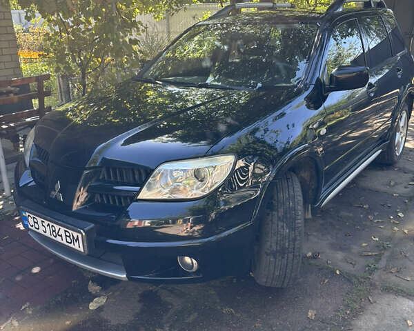 Міцубісі Аутлендер 2008 у Києві на Automoto.ua Чорний Міцубісі Аутлендер, об'ємом двигуна 2 л та пробігом 228 тис. км за 7300 $, фото 1 на Automoto.ua
