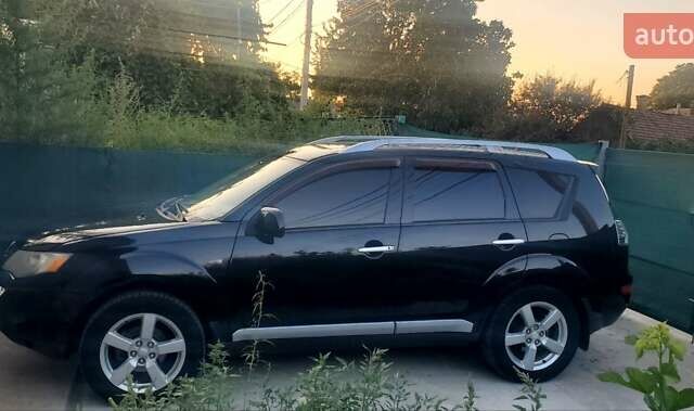 Чорний Міцубісі Аутлендер, об'ємом двигуна 3 л та пробігом 280 тис. км за 8100 $, фото 1 на Automoto.ua