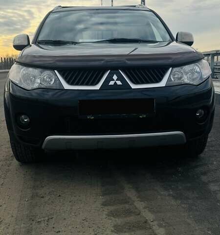 Чорний Міцубісі Аутлендер, об'ємом двигуна 2.36 л та пробігом 268 тис. км за 8200 $, фото 1 на Automoto.ua