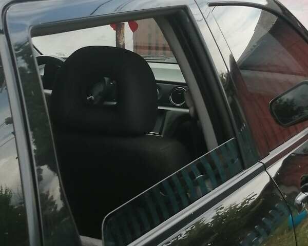 Чорний Міцубісі Аутлендер, об'ємом двигуна 2 л та пробігом 208 тис. км за 6700 $, фото 1 на Automoto.ua