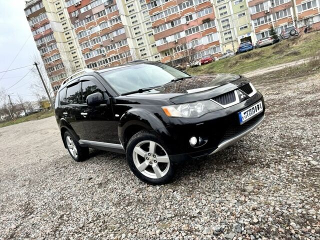 Чорний Міцубісі Аутлендер, об'ємом двигуна 2.4 л та пробігом 229 тис. км за 9790 $, фото 1 на Automoto.ua