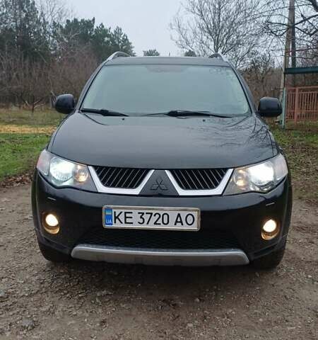 Черный Мицубиси Аутлендер, объемом двигателя 3 л и пробегом 152 тыс. км за 8700 $, фото 1 на Automoto.ua