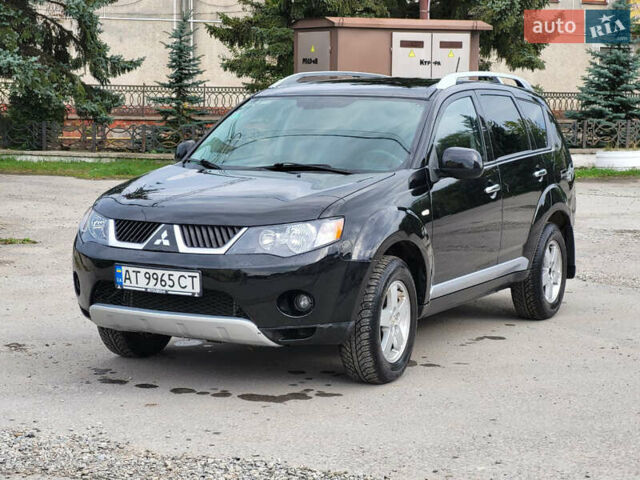 Чорний Міцубісі Аутлендер, об'ємом двигуна 2.4 л та пробігом 205 тис. км за 8400 $, фото 1 на Automoto.ua