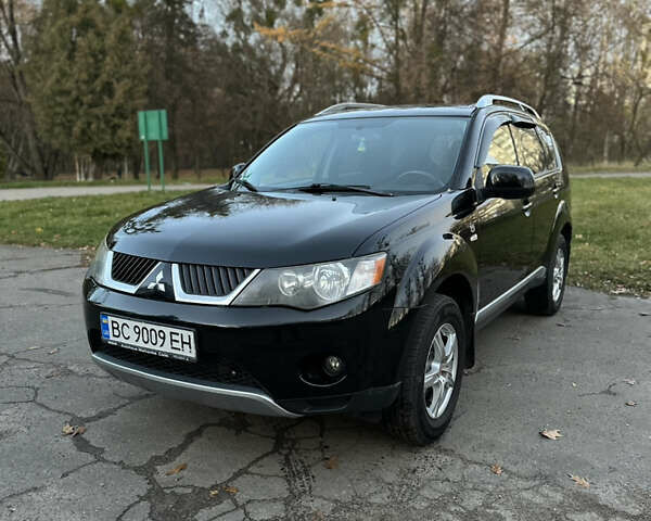 Чорний Міцубісі Аутлендер, об'ємом двигуна 1.97 л та пробігом 300 тис. км за 8600 $, фото 1 на Automoto.ua