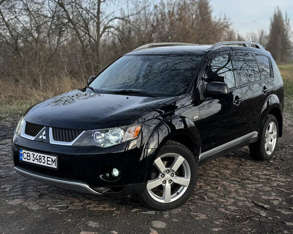 Чорний Міцубісі Аутлендер, об'ємом двигуна 2.36 л та пробігом 293 тис. км за 7900 $, фото 1 на Automoto.ua