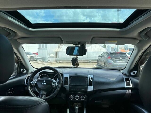 Чорний Міцубісі Аутлендер, об'ємом двигуна 2.4 л та пробігом 137 тис. км за 8999 $, фото 1 на Automoto.ua