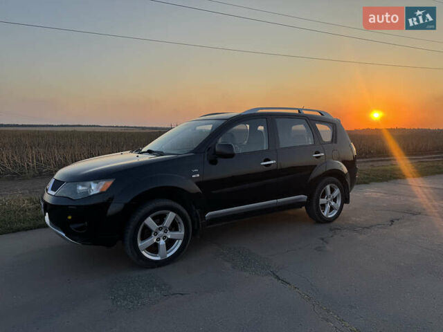 Чорний Міцубісі Аутлендер, об'ємом двигуна 3 л та пробігом 236 тис. км за 9800 $, фото 1 на Automoto.ua