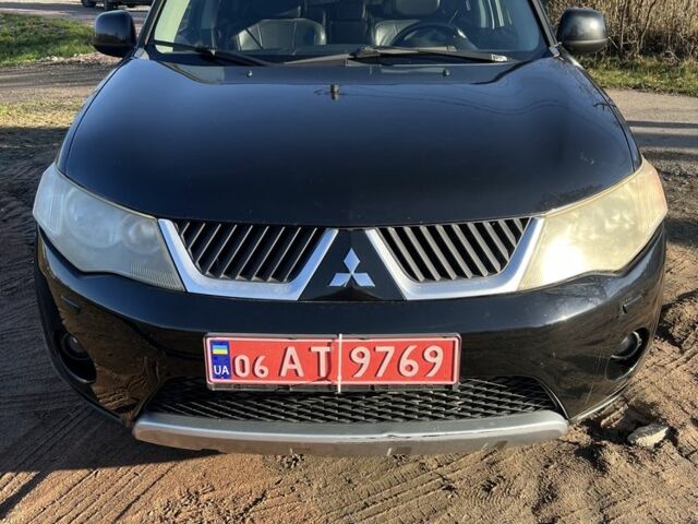 Черный Мицубиси Аутлендер, объемом двигателя 2 л и пробегом 247 тыс. км за 4600 $, фото 1 на Automoto.ua