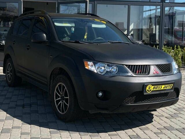 Черный Мицубиси Аутлендер, объемом двигателя 3 л и пробегом 308 тыс. км за 7600 $, фото 1 на Automoto.ua