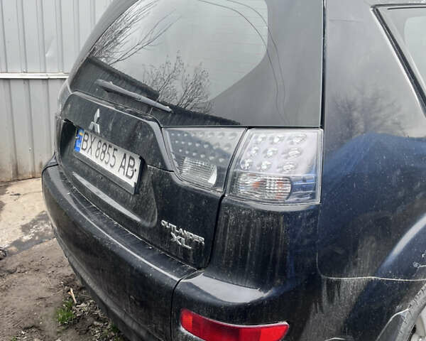 Чорний Міцубісі Аутлендер, об'ємом двигуна 2.4 л та пробігом 180 тис. км за 4500 $, фото 1 на Automoto.ua