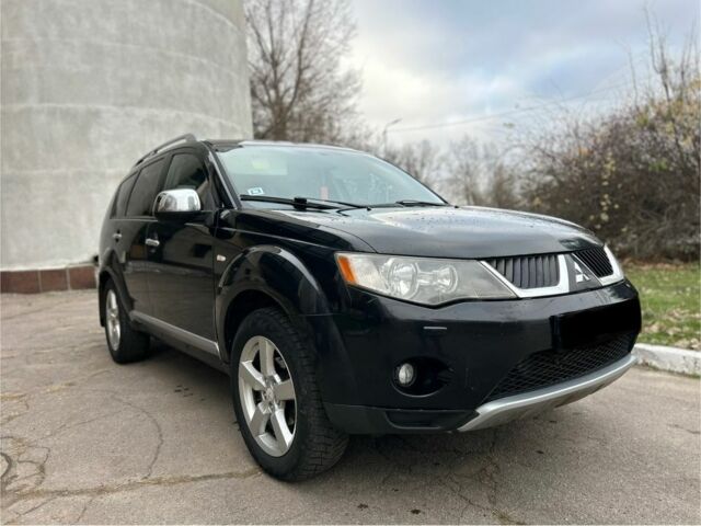 Чорний Міцубісі Аутлендер, об'ємом двигуна 2 л та пробігом 238 тис. км за 5500 $, фото 1 на Automoto.ua