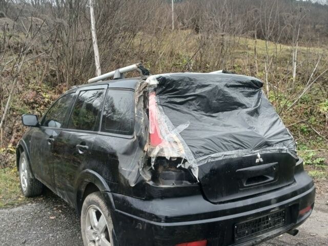 Чорний Міцубісі Аутлендер, об'ємом двигуна 0 л та пробігом 177 тис. км за 1700 $, фото 1 на Automoto.ua