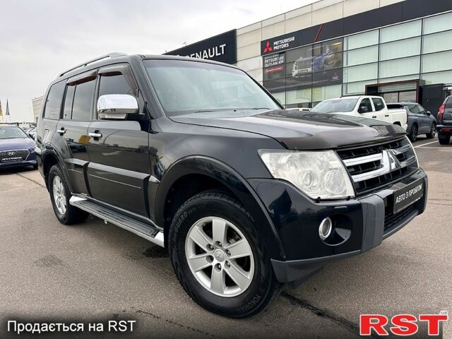 Черный Мицубиси Аутлендер, объемом двигателя 3 л и пробегом 218 тыс. км за 11950 $, фото 1 на Automoto.ua
