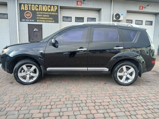 Чорний Міцубісі Аутлендер, об'ємом двигуна 3 л та пробігом 300 тис. км за 9600 $, фото 1 на Automoto.ua