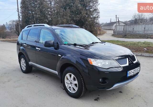 Чорний Міцубісі Аутлендер, об'ємом двигуна 2.2 л та пробігом 275 тис. км за 9900 $, фото 1 на Automoto.ua