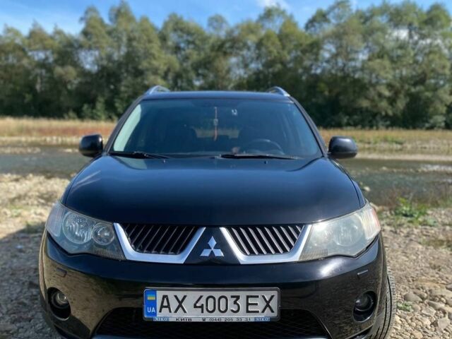 Черный Мицубиси Аутлендер, объемом двигателя 3 л и пробегом 150 тыс. км за 400 $, фото 1 на Automoto.ua