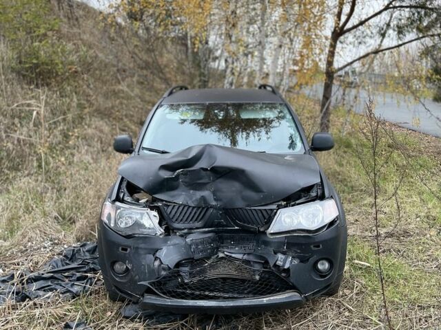 Черный Мицубиси Аутлендер, объемом двигателя 2 л и пробегом 360 тыс. км за 2000 $, фото 1 на Automoto.ua