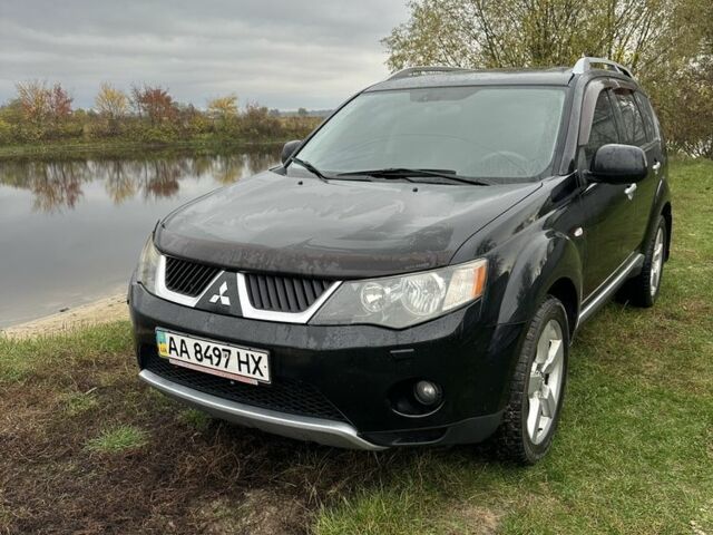 Чорний Міцубісі Аутлендер, об'ємом двигуна 2.4 л та пробігом 186 тис. км за 8700 $, фото 1 на Automoto.ua