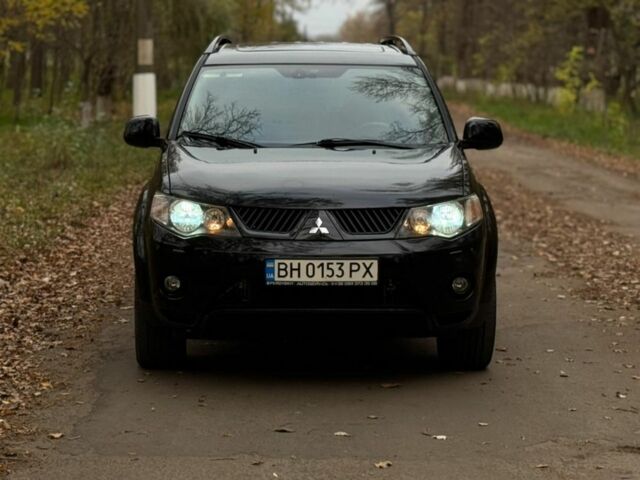 Чорний Міцубісі Аутлендер, об'ємом двигуна 3 л та пробігом 212 тис. км за 10000 $, фото 1 на Automoto.ua