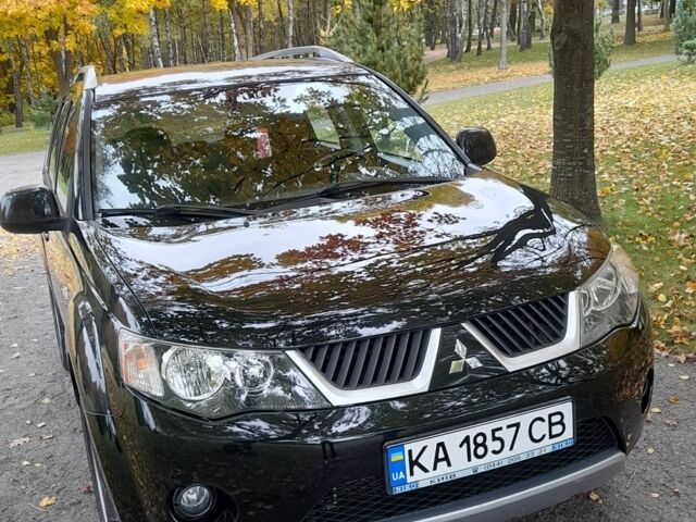 Міцубісі Аутлендер 2009 у Хмельницькому на Automoto.ua Чорний Міцубісі Аутлендер, об'ємом двигуна 2.4 л та пробігом 157 тис. км за 8500 $, фото 1 на Automoto.ua
