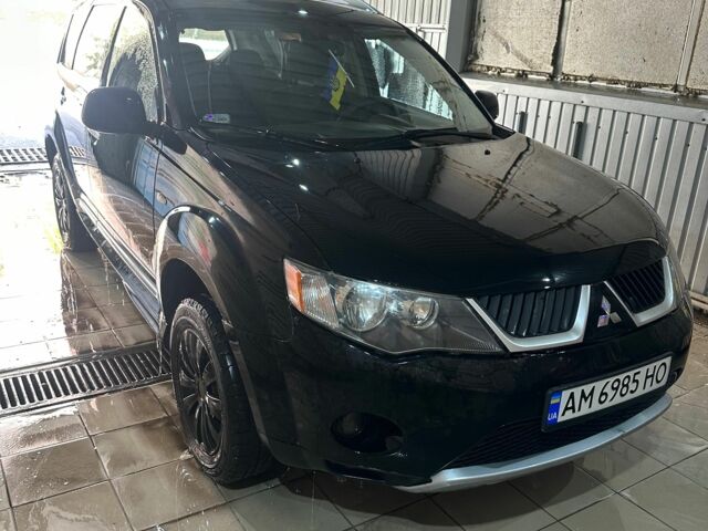 Чорний Міцубісі Аутлендер, об'ємом двигуна 2 л та пробігом 259 тис. км за 3900 $, фото 1 на Automoto.ua