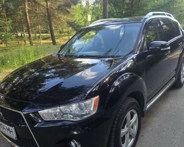 Чорний Міцубісі Аутлендер, об'ємом двигуна 2 л та пробігом 247 тис. км за 10100 $, фото 1 на Automoto.ua