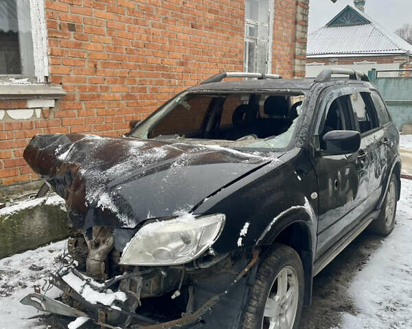 Черный Мицубиси Аутлендер, объемом двигателя 2 л и пробегом 109 тыс. км за 1550 $, фото 1 на Automoto.ua