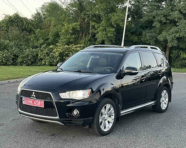 Черный Мицубиси Аутлендер, объемом двигателя 0 л и пробегом 257 тыс. км за 10399 $, фото 1 на Automoto.ua