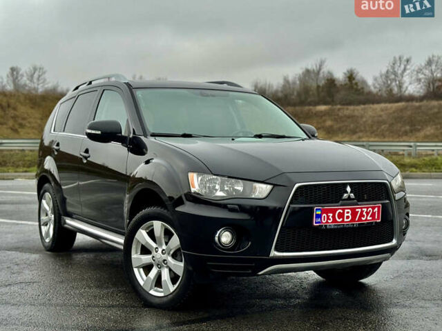 Чорний Міцубісі Аутлендер, об'ємом двигуна 2 л та пробігом 228 тис. км за 10550 $, фото 1 на Automoto.ua