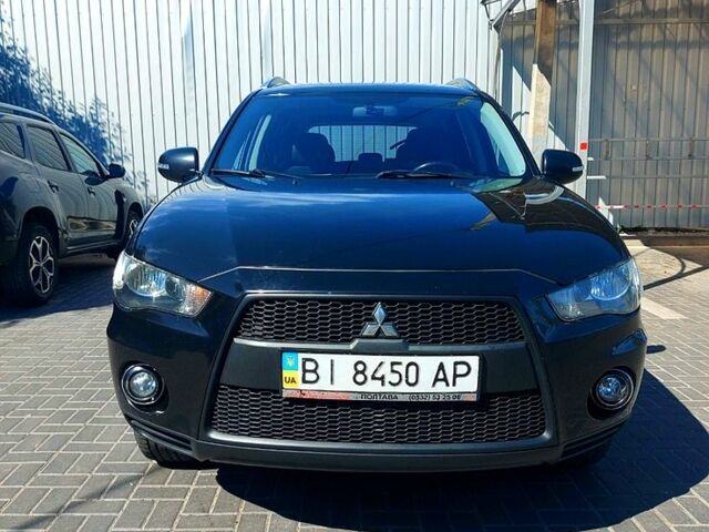 Чорний Міцубісі Аутлендер, об'ємом двигуна 2 л та пробігом 291 тис. км за 11200 $, фото 1 на Automoto.ua